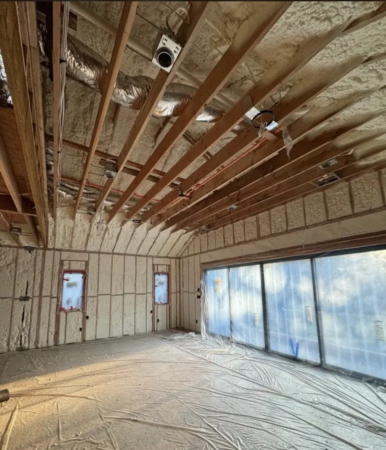 Interior walls and ceiling insulated with spray foam during new construction in Hitchcock